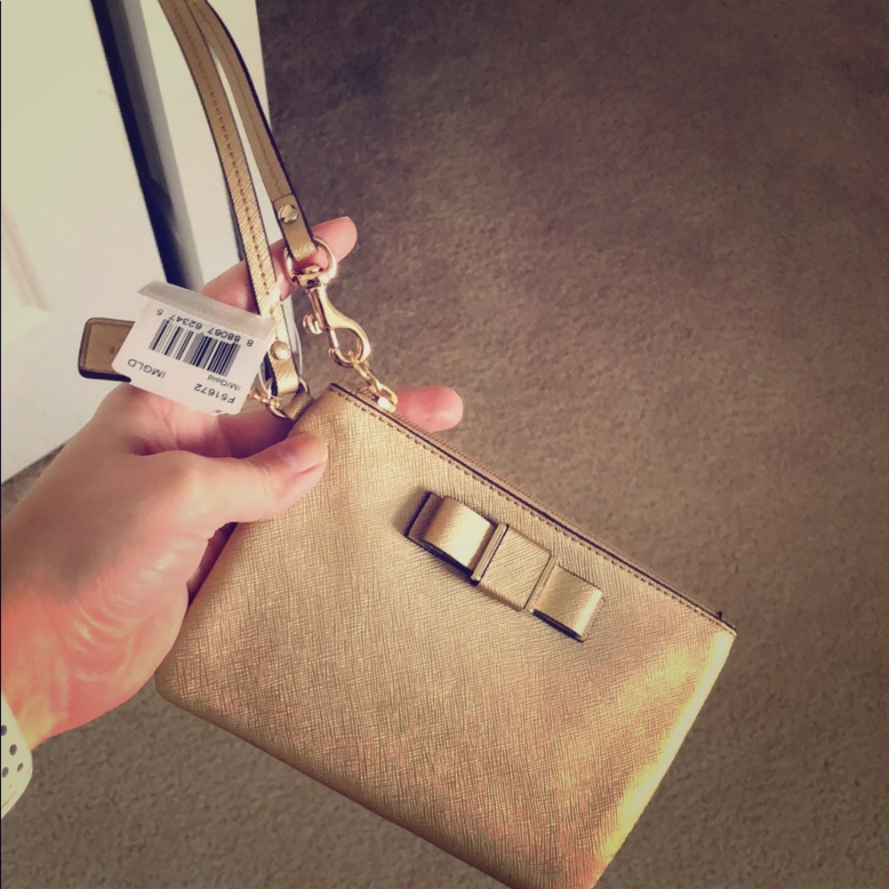 Coach wristlet - Gold